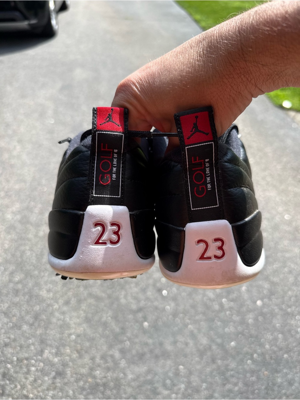 Jordan Men’s Golf sneaker cleats in Black, Red & White